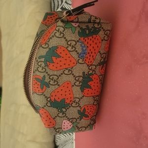 Gucci strawberry pouch